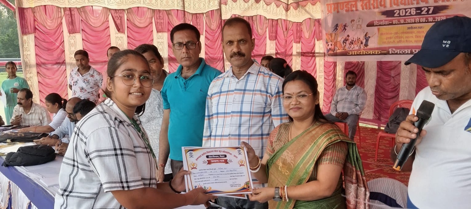Ritika Raj receiving her certificate at the Koshi Divisional Sports Meet